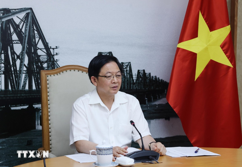 ttxvn-pho-thu-tuong-ho-quoc-dung-hop-ve-nghi-dinh-huong-dan-luat-cong-nghe-cao-2.jpg