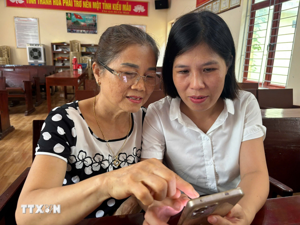 ttxvn-dang-vien-sinh-hoat-chi-bo-1-nghi-quyet-57-3.jpg