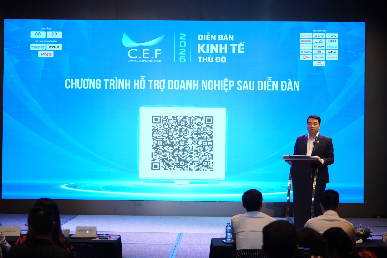 Ông Mạc Quốc Anh thông tin về chương trình hỗ trợ doanh nghiệp nhỏ và vừa Hà Nội. (Ảnh: XM/Báo Tin tức và Dân tộc)