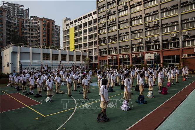Học sinh tại một trường học ở Hong Kong, Trung Quốc. (Ảnh: AFP/ TTXVN (Ảnh không cho phép bên thứ ba khai thác, chia sẻ lại))